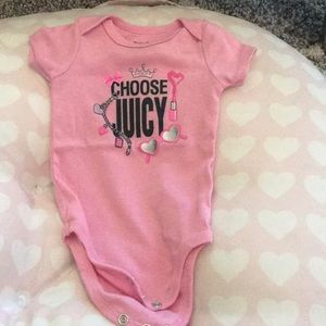 Juicy Couture pink onesie.